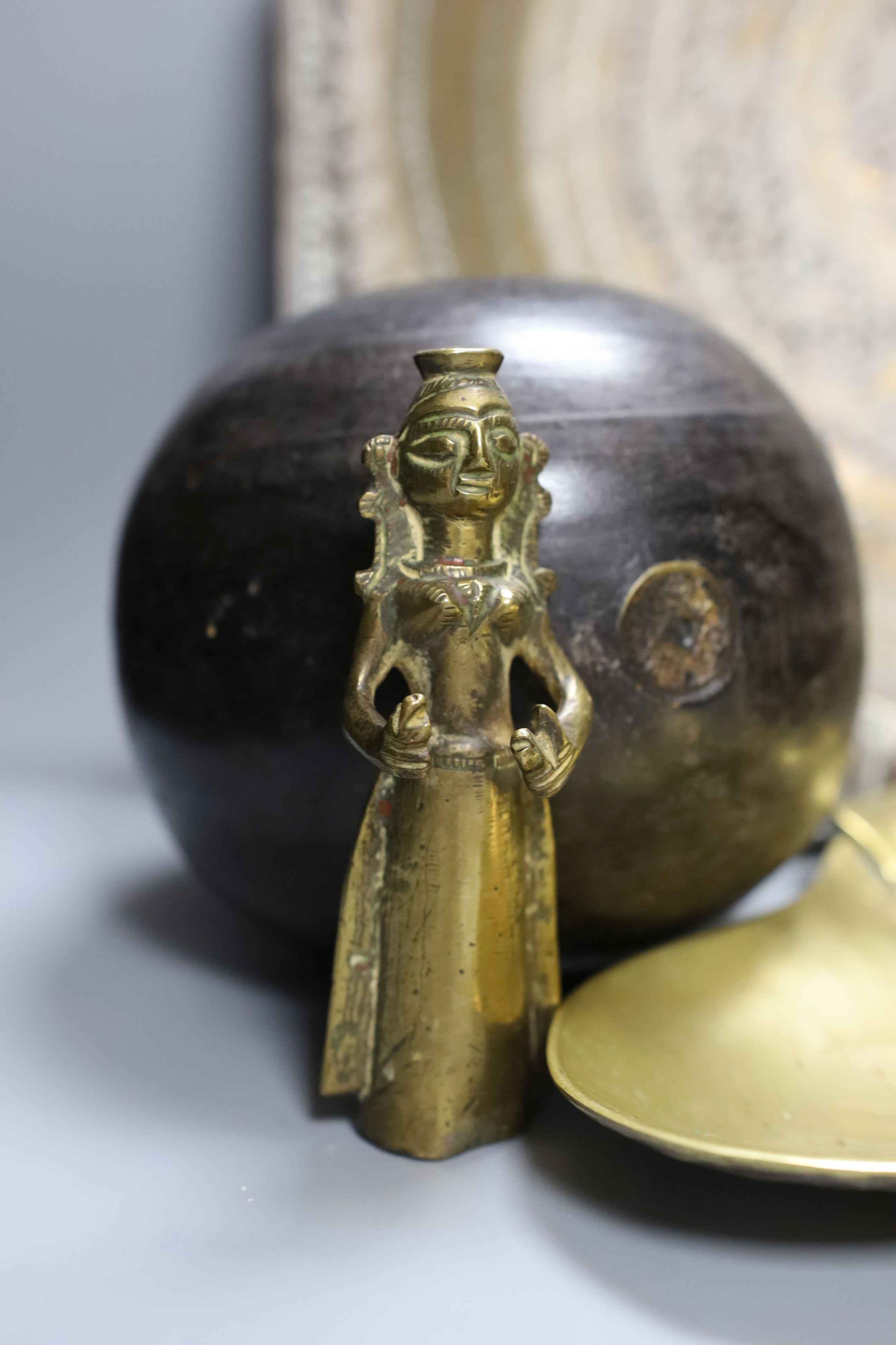 Metalware to include - a Sino-Tibetan bronze amulet, a Bidri ware dish, a Chinese paktong handwarmer Asian wood balls with inset coins etc